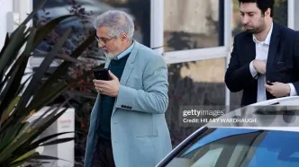 لحظه خروج سفیر ایران پس از اخراج از سفارت استرالیا
