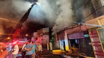 حریق در خیابان انقلاب تهران + عکس و فیلم