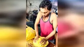 تصاویر کاملا عادی از یک کارخانه قنادی در هند!