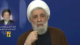 شیخ نعیم قاسم در لباس نظامی