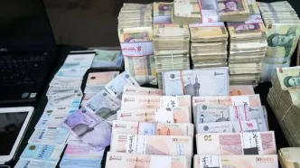 چرا ارزش پول ملی فرو می‌ریزد؟