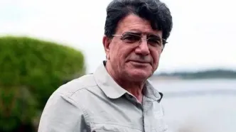 استاد شجریان در حال باد زدن جوجه با جارو!