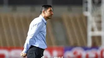 شعار هواداران پرسپولیس علیه هاشمیان و درویش