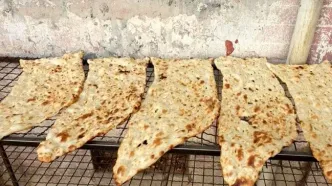 با یک تراول 50 تومانی فقط دو نان سنگ می‌توان خرید!