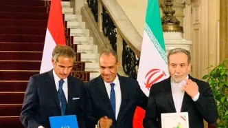 امضای توافق نامه از سرگیری مجدد همکاری بین ایران و آژانس