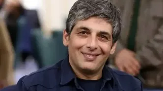 کودکی حمید گودرزی در آغوش پدرانه