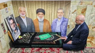 حضور قالیباف بر سر مزار سرلشکر شهید محمدسعید ایزدی در حرم حضرت معصومه(س) +عکس