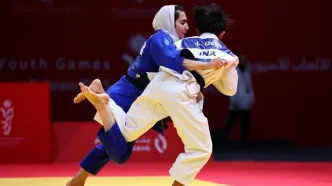 مدال طلای جودو بر گردن دختر ایران