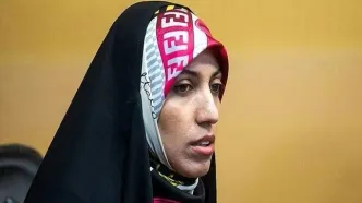 عکس یادگاری آمنه سادات ذبیح‌پور با پسر حسن نصرالله