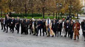 تصاویر ادای احترام هیات پارلمانی ایران به قربانیان جنگ در روسیه