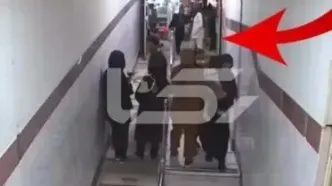 فیلم سرقت عجیب در درمانگاه امام رضا کرمانشاه / دزدی گوشواره از گوش دختربچه در آغوش مادر