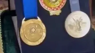 ببینید| قهرمانان کشتی مدال‌هایشان را به موزه آستان قدس اهدا کردند
