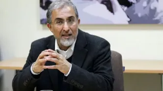 کنایه حسین راغفر به قرارداد دولت با بابک زنجانی؛ امضای قرارداد با فردی که حتی مبل خانه او را ضبط کرده بودند طنز تلخی است