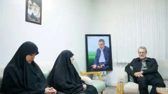 دیدار لاریجانی با خانواده شهید ایزدی