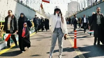 اعتراض روزنامه همشهری به منتقدان پوستر یک دختر شل حجاب در سایت رهبر انقلاب/ می گویند رهبری هم صورتی بازی درمی آورد