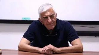 تصویری از رضا کیانیان در کنار همسر و پسرش