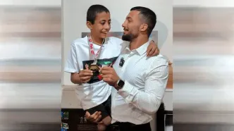 گرایی مدال طلای خود را به کودک بدسرپرست هدیه داد