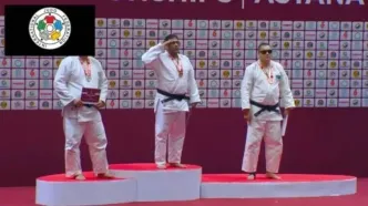 طلای آسیا بر گردن علی نوایی؛ سلام نظامی قهرمان به پرچم ایران