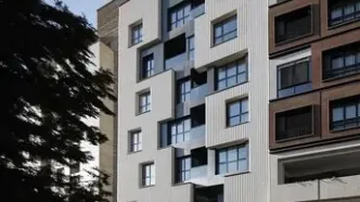 معماری مینیمال این ساختمان در قیطریه دیدنی است