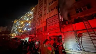 آتش‌سوزی نیمه‌شب در قلب تهران / نجات معجزه‌آسای 70 مسافر + عکس و فیلم