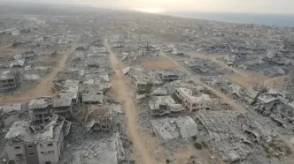 در محله تل‌الهوی غزه، تا چشم کار می‌کند ویرانی است