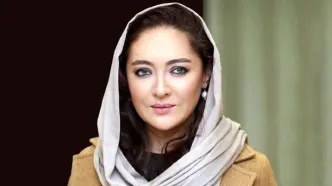 نیکی کریمی در کنار علی دایی روی نیکمت