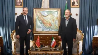 دیدار وزیر امور خارجه ترکیه با علی لاریجانی