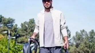 درگیری عجیب خلیل‌زاده با یک خبرنگار در فرودگاه/ویدیو