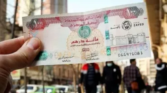 فرهیختگان: امارات اقتصاد ایران را گروگان گرفته