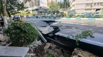 فرونشست زمین در تهران خودروها را بلعید!+عکس