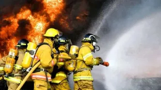 یک ساختمان ۴ طبقه در ولیعصر تهران در آتش سوخت +جزئیات