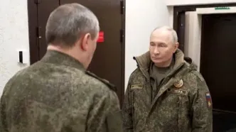 حضور پوتین با لباس نظامی در قرارگاه فرماندهی ارتش روسیه