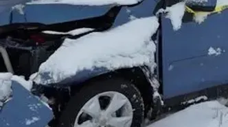 گیر کردن خودروها در برف سنگین آیووا