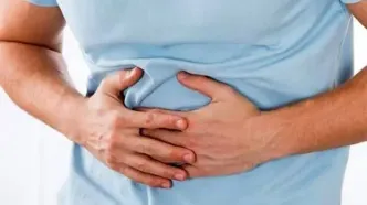 دلیل اصلی انسداد روده بر اثر مصرف خرمالو چیست؟ + روش درمان