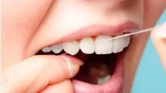 به این دلیل مهم حتما نخ دندان بکشید