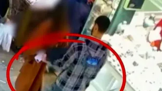 لحظه سرقت موبایل دختر جوان در عرض چند ثانیه