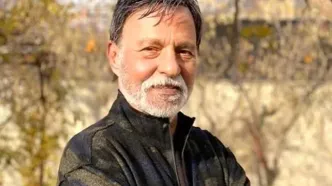 مرتضی عقیلی در کنار تنها یادگار پسرش در اکران فیلم «های کپی»