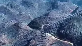 رشته‌کوه‌های پوشیده از تأسیسات بزرگ پنل خورشیدی در چین