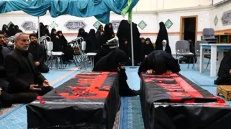 پیکر همسر و فرزند اسماعیل سقاب در مشهد تشییع شد