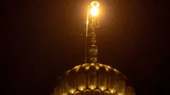 تصاویر زیبا از بارش باران در حرم امام علی(ع)