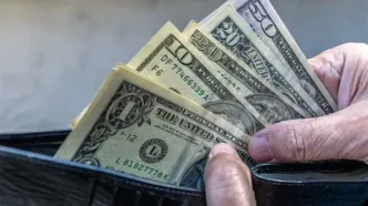 کاهش قیمت رسمی دلار