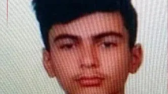 سنگ‌پرانی در تشییع شهید خدایاری