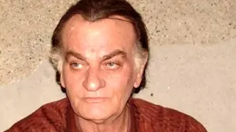 فتحعلی اویسی در ۴۰سالگی و در کنار پسرش؛ سال ۶۴