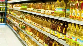 تصویر نصب دزدگیر روی در قوطی‌ روغن در فروشگاه‌ها!