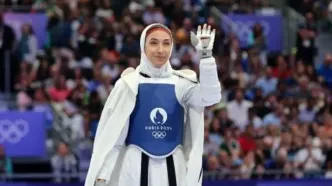 مدال طلا بر گردن مبینا نعمت‌زاده در امارات