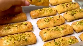 عصرونه امروز: طرز تهیه شیرینی نارگیلی با خمیر هزارلا!