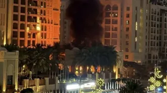 تصاویری از آسمان‌خراش‌های امارات زیر ضرب موشک‌های ایران