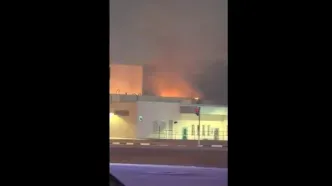 کنسولگری آمریکا در دبی پس از هدف قرار گرفتن در آتش می‌سوزد | فیلم