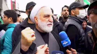 لحظه اصابت موشک به نزدیکی محسنی اژه‌ای در راهپیمایی