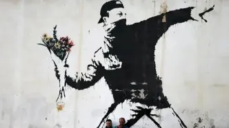 رویترز: هویت واقعی «بنکسی» هنرمند ناشناسِ مشهور فاش شد